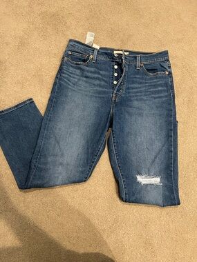 Levi's High-Rise Dark Blue Button-Fly Jeans with Knee Distress